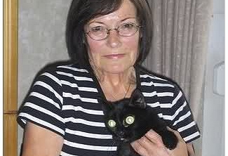 Kočka Bony se svou majitelkou.