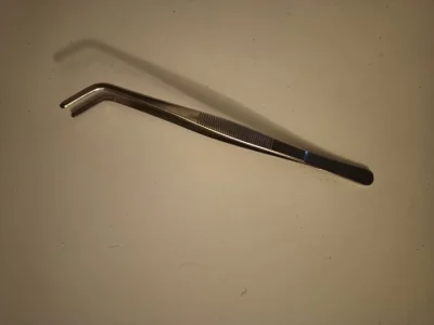 Pinzeta nerezová zahnutá 25cm